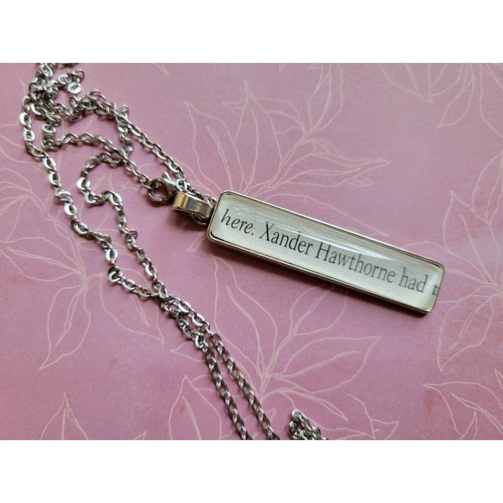 Xander Hawthorne pendant necklace made with The Inheritance Games book pages